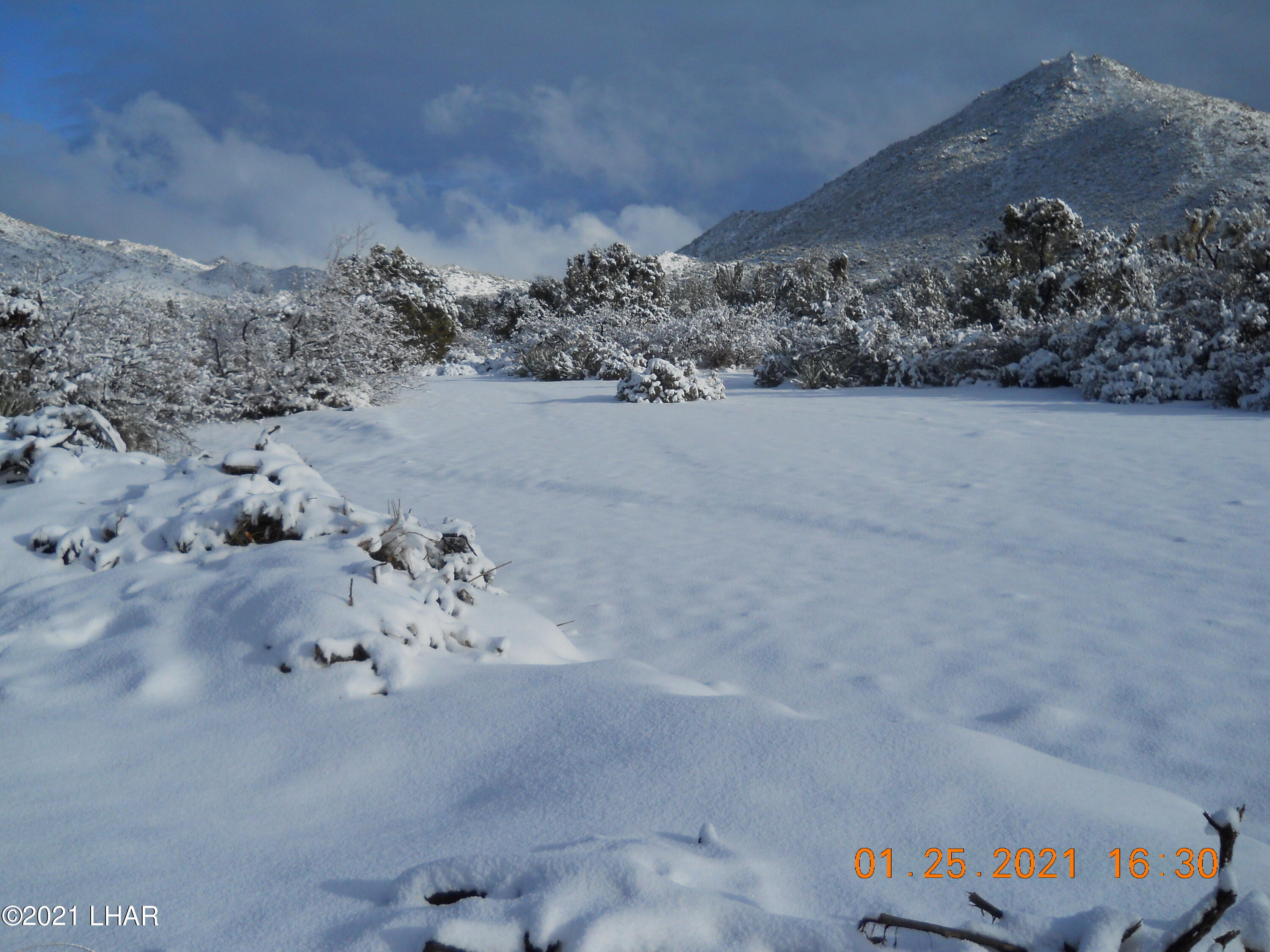 3288 D South Gold Mine Road Yucca, AZ 86438 - Photo 52 of 97 Occasional snow on property
