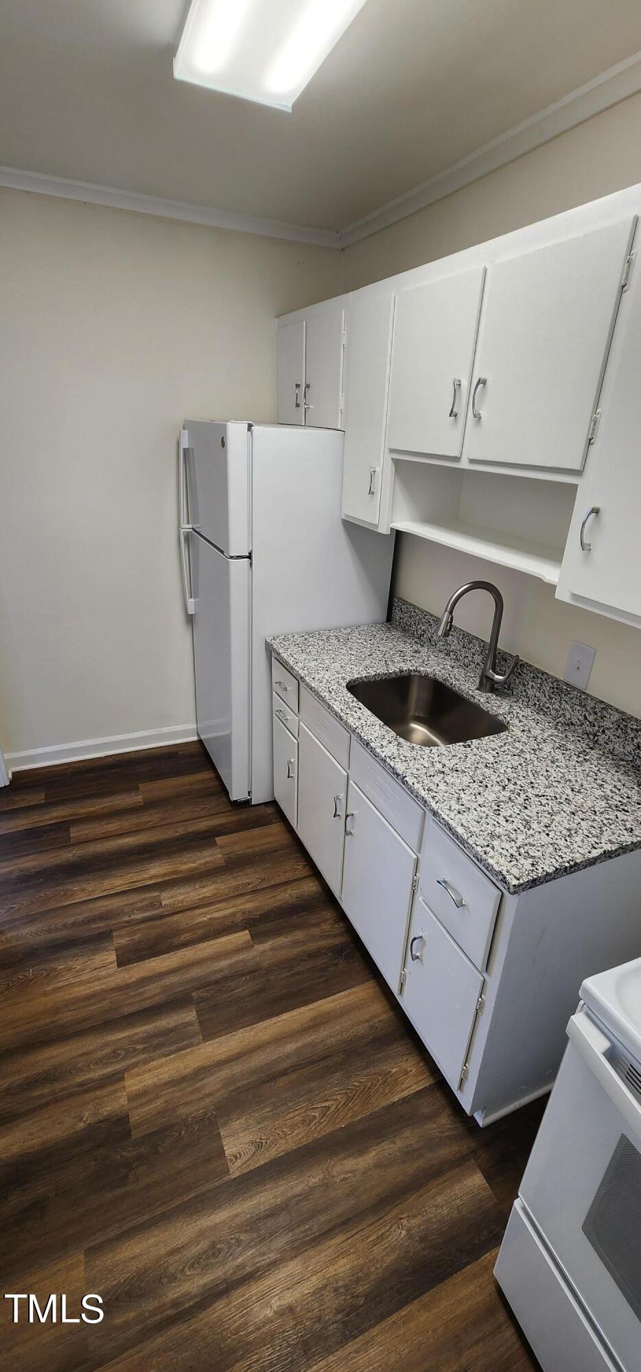 705 Daniels Street, Unit B Raleigh, NC 27605 - Photo 8 of 12 Kitchen 2