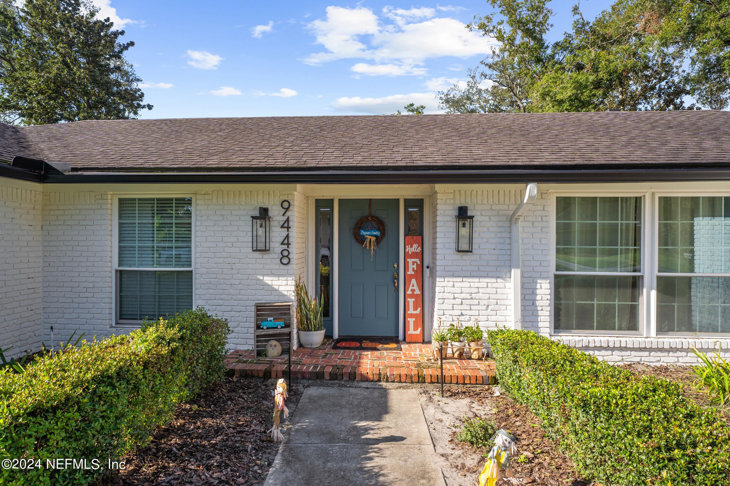 9448 Wexford Road Jacksonville, FL 32257 - Photo 2 of 27 front view of a house with a large window