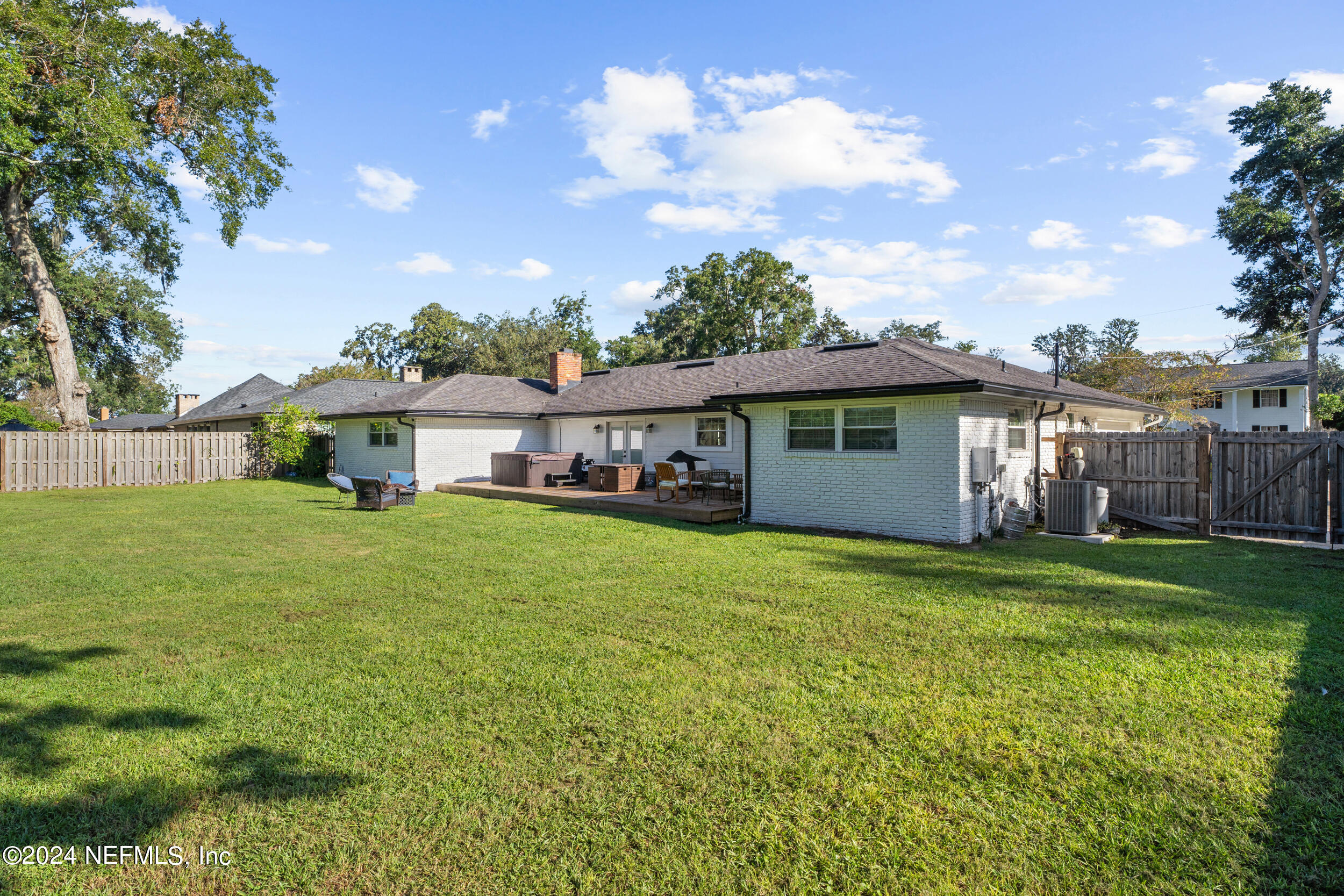 9448 Wexford Road Jacksonville, FL 32257 - Photo 25 of 27 a front view of a house with a garden