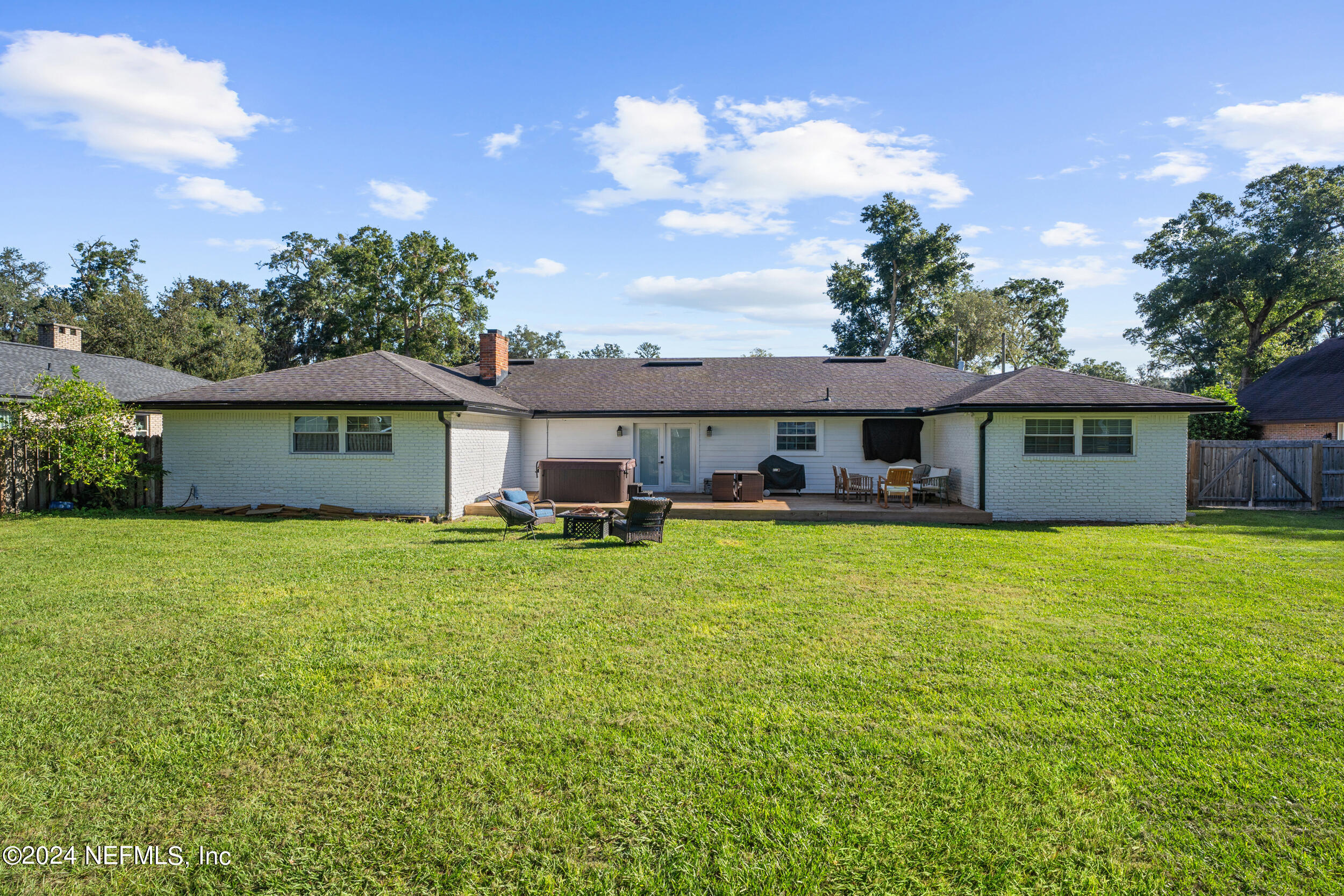 9448 Wexford Road Jacksonville, FL 32257 - Photo 26 of 27 a front view of a house with a garden
