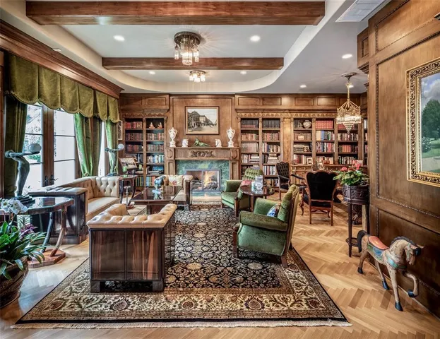 a living room with furniture and a rug