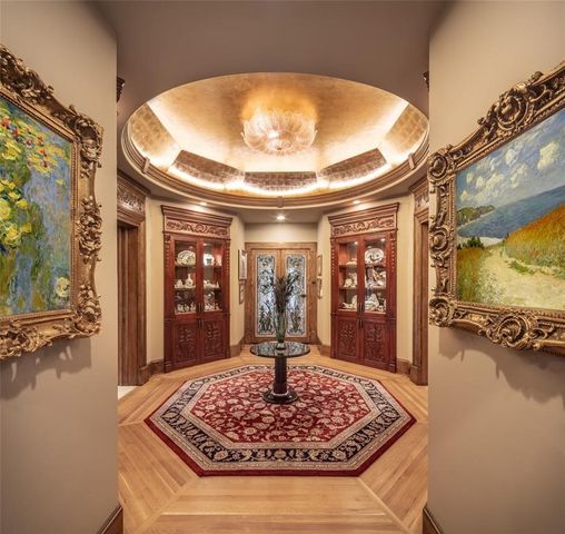 a view of a very nice looking dining room with a table and chairs