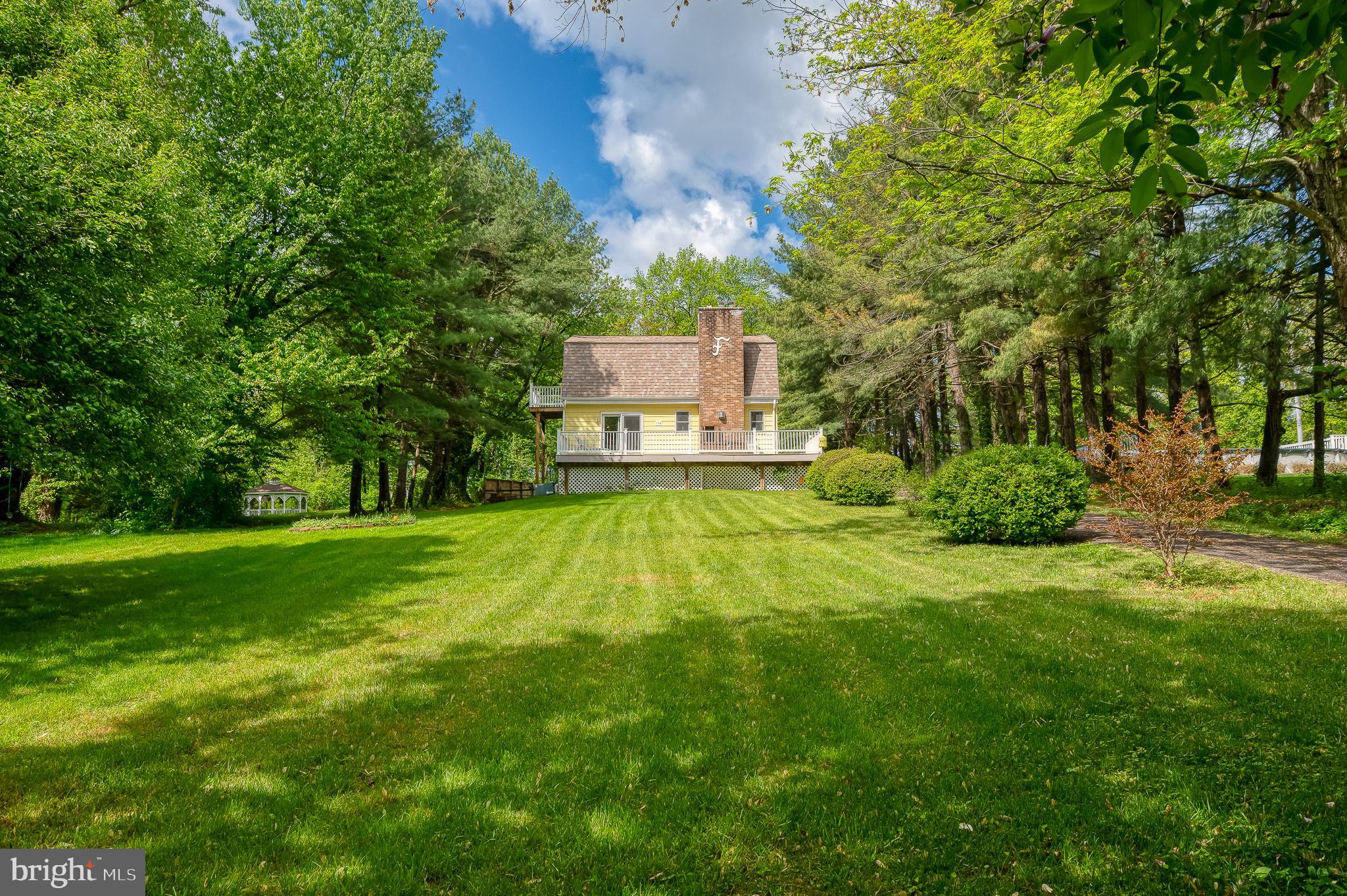 710 Magnolia Road Joppa, MD 21085 - Photo 40 of 58 a view of a big yard with large trees