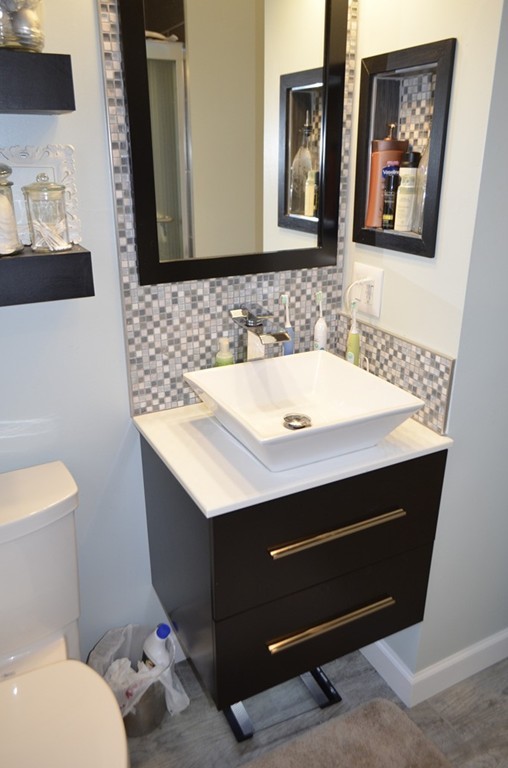 51 Cheyenne Road Springfield, MA 01109 - Photo 13 of 28 a bathroom with a sink and a toilet