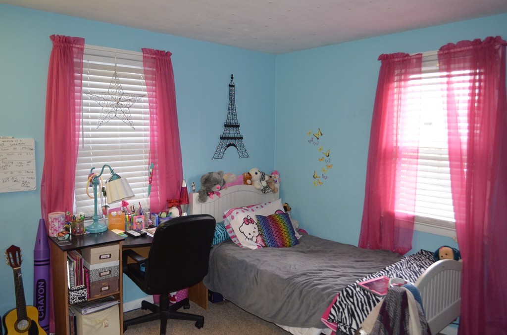 51 Cheyenne Road Springfield, MA 01109 - Photo 19 of 28 a bedroom with a bed and a window