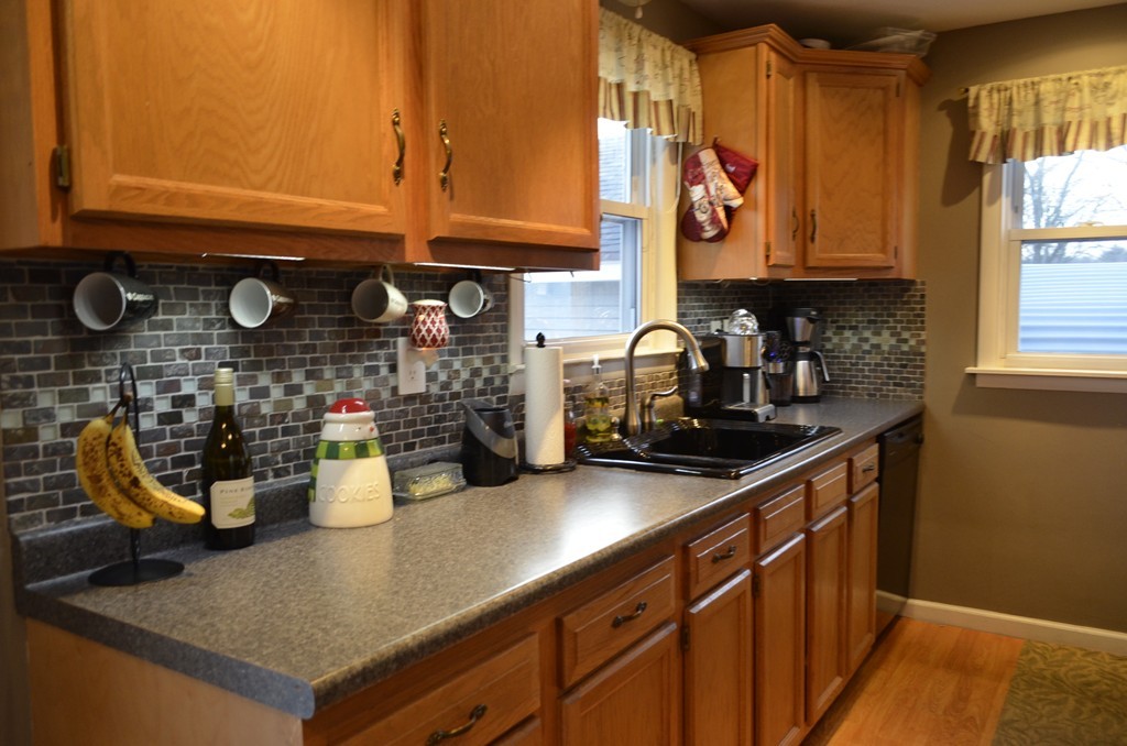 51 Cheyenne Road Springfield, MA 01109 - Photo 24 of 28 a kitchen with sink and cabinets