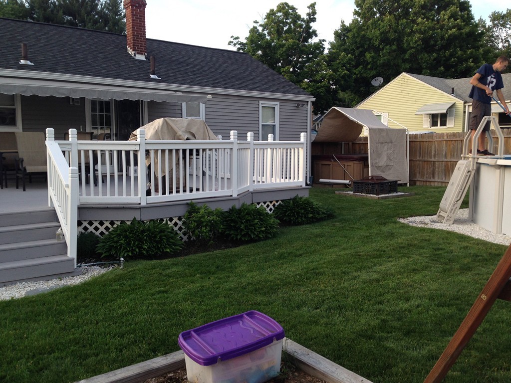 51 Cheyenne Road Springfield, MA 01109 - Photo 26 of 28 a view of a house with a yard and furniture