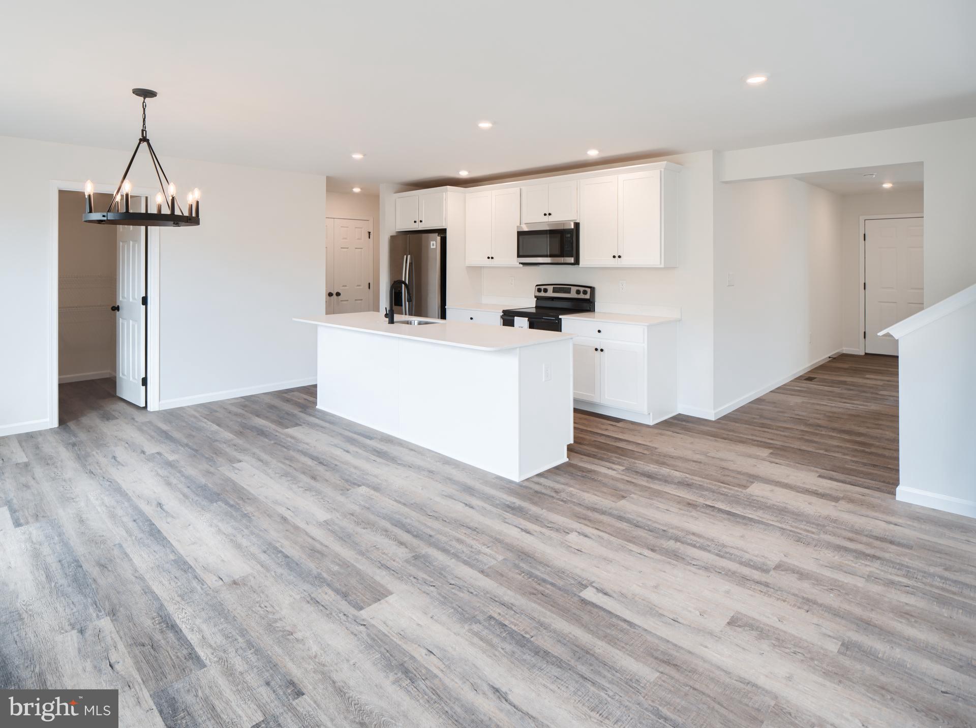 311 Boxwood Drive Windsor, PA 17366 - Photo 14 of 50 a view of kitchen with microwave and refrigerator