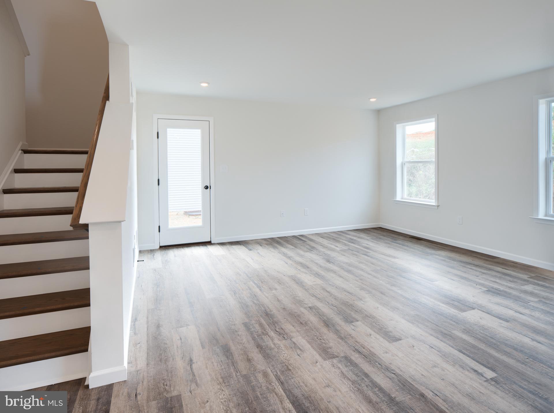 311 Boxwood Drive Windsor, PA 17366 - Photo 2 of 50 wooden floor in an empty room with a window
