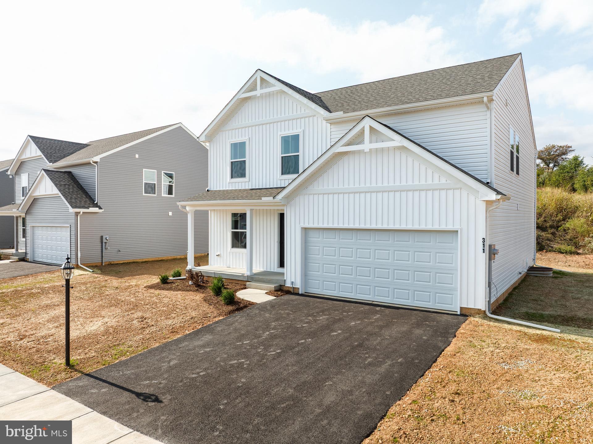 311 Boxwood Drive Windsor, PA 17366 - Photo 43 of 50 a view of a house with snow on the road