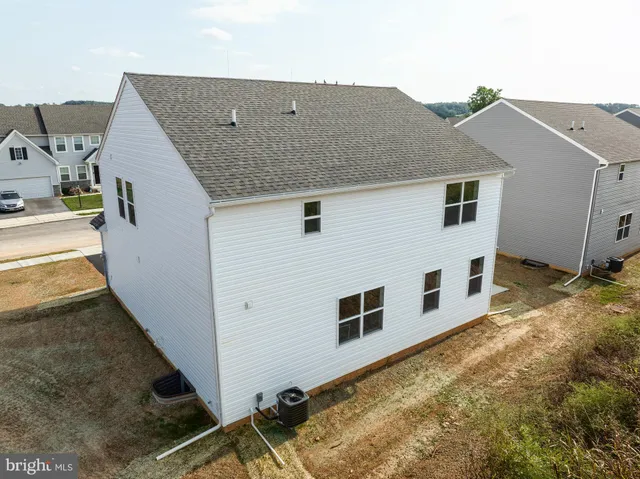a house view with a backyard space