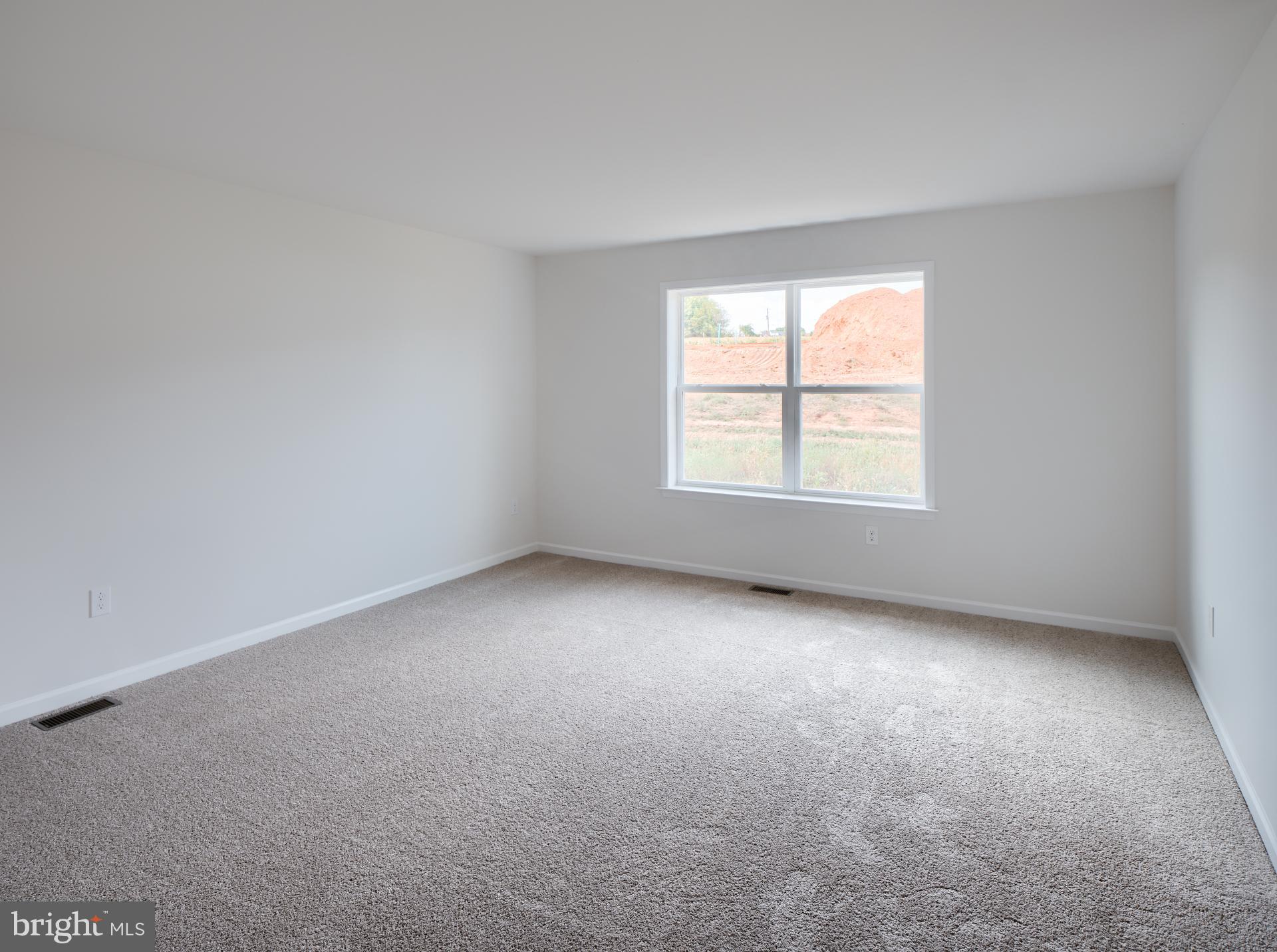 311 Boxwood Drive Windsor, PA 17366 - Photo 5 of 50 an empty room with a window