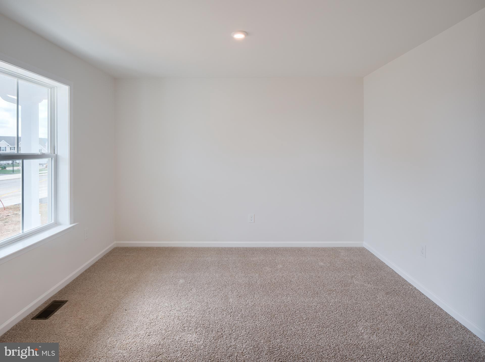 311 Boxwood Drive Windsor, PA 17366 - Photo 8 of 50 an empty room with a window