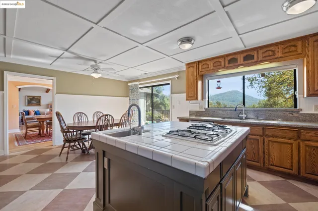 a room with a door and a chandelier