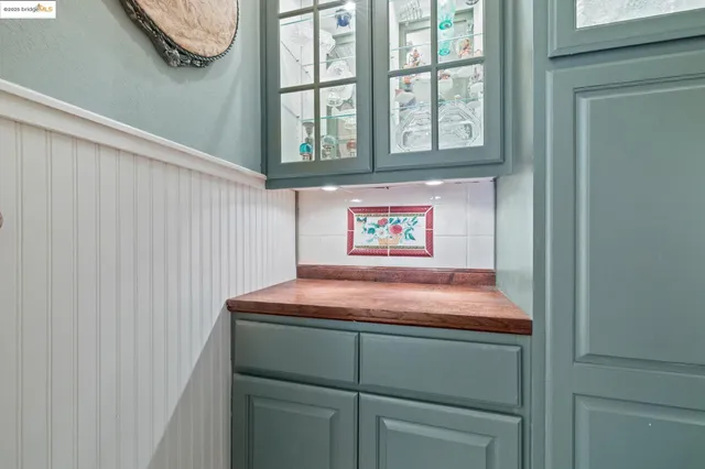 a bed room with a bed and a lamp