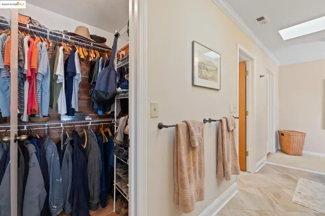 a bathroom with a sink a toilet a mirror and vanity