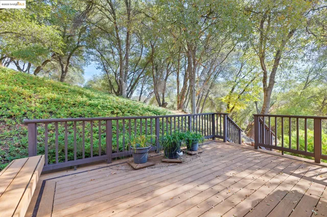 a bathroom with a tub and shower