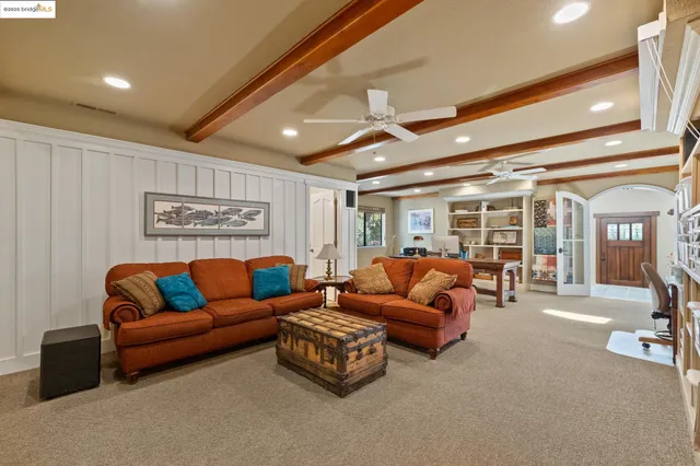 a bathroom with a sink a vanity and a window