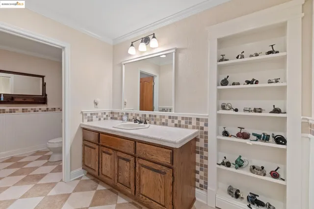 a view of a patio with chairs next to a yard