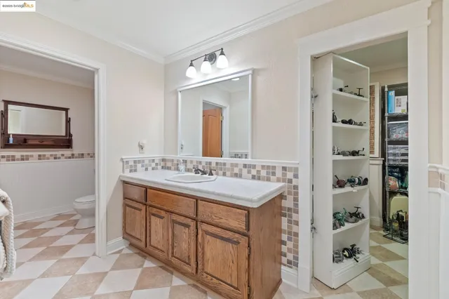 a view of balcony with furniture and wooden floor