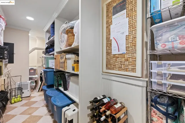 a balcony with furniture and wooden floor