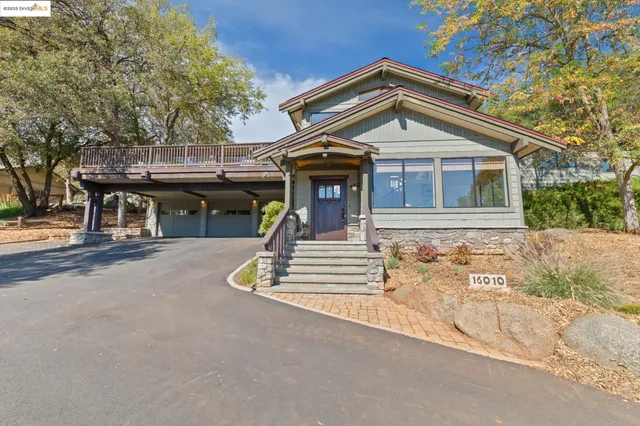 a view of a chairs on the roof deck