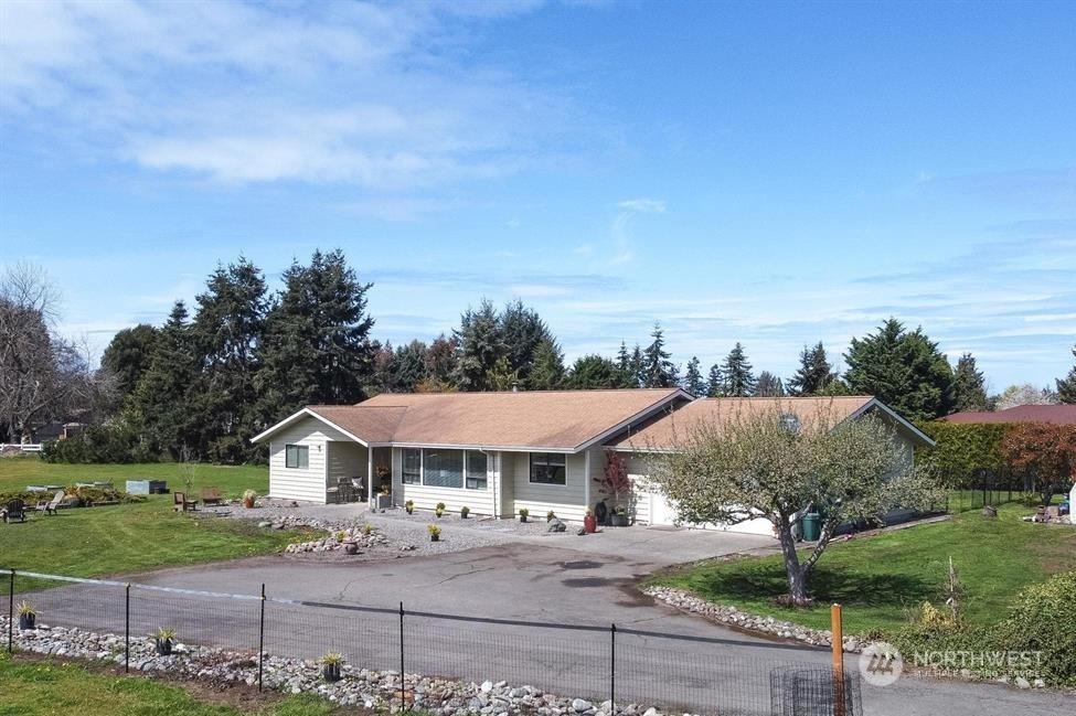 819 North Kendall Road Sequim, WA 98382 - Photo 1 of 40 an outdoor view of house with yard