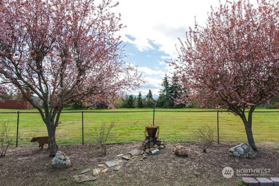 819 North Kendall Road Sequim, WA 98382 - Photo 8 of 40 a view of a park with large trees