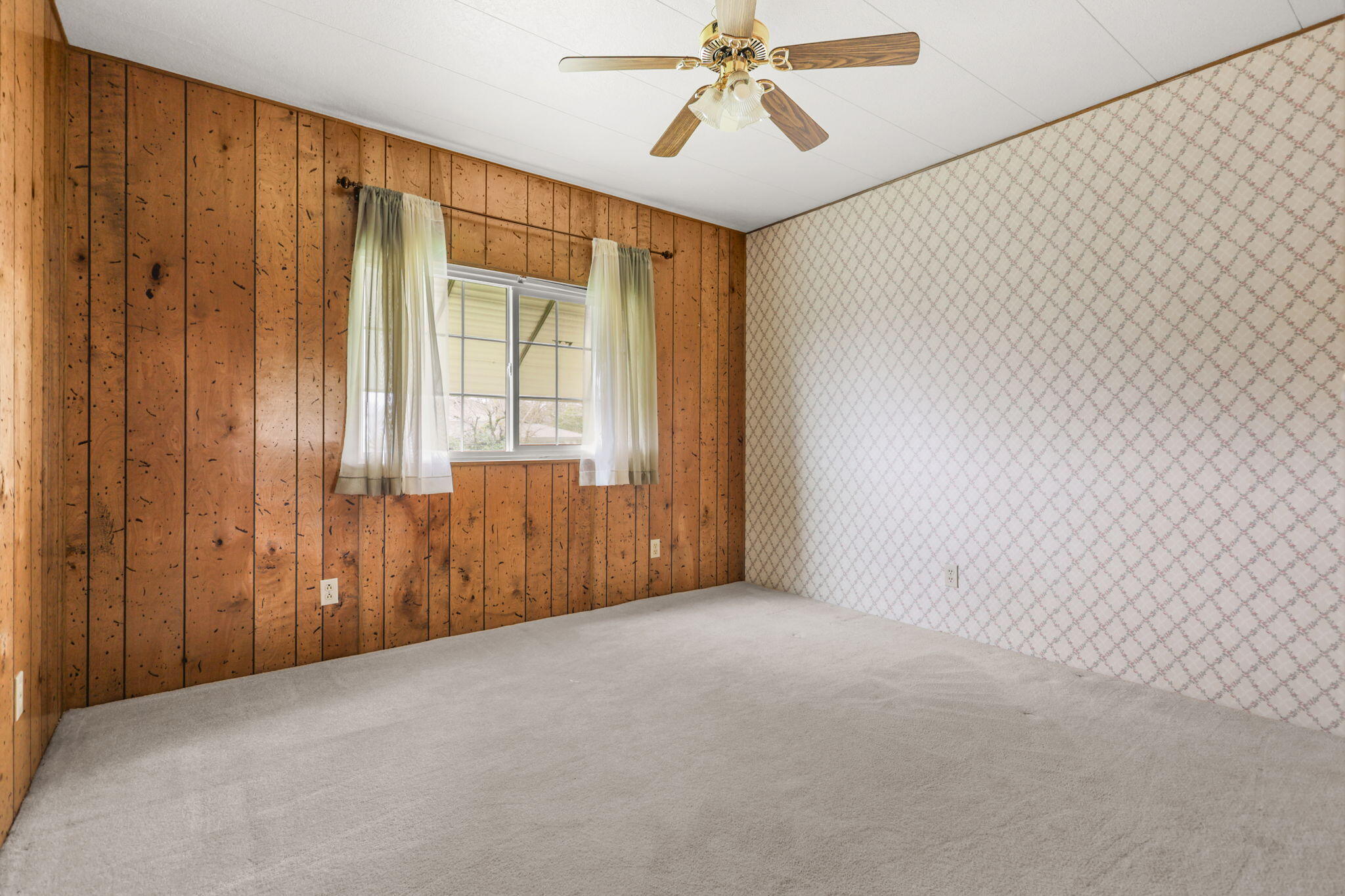836 August Way Redding, CA 96003 - Photo 21 of 32 a view of an empty room with a window