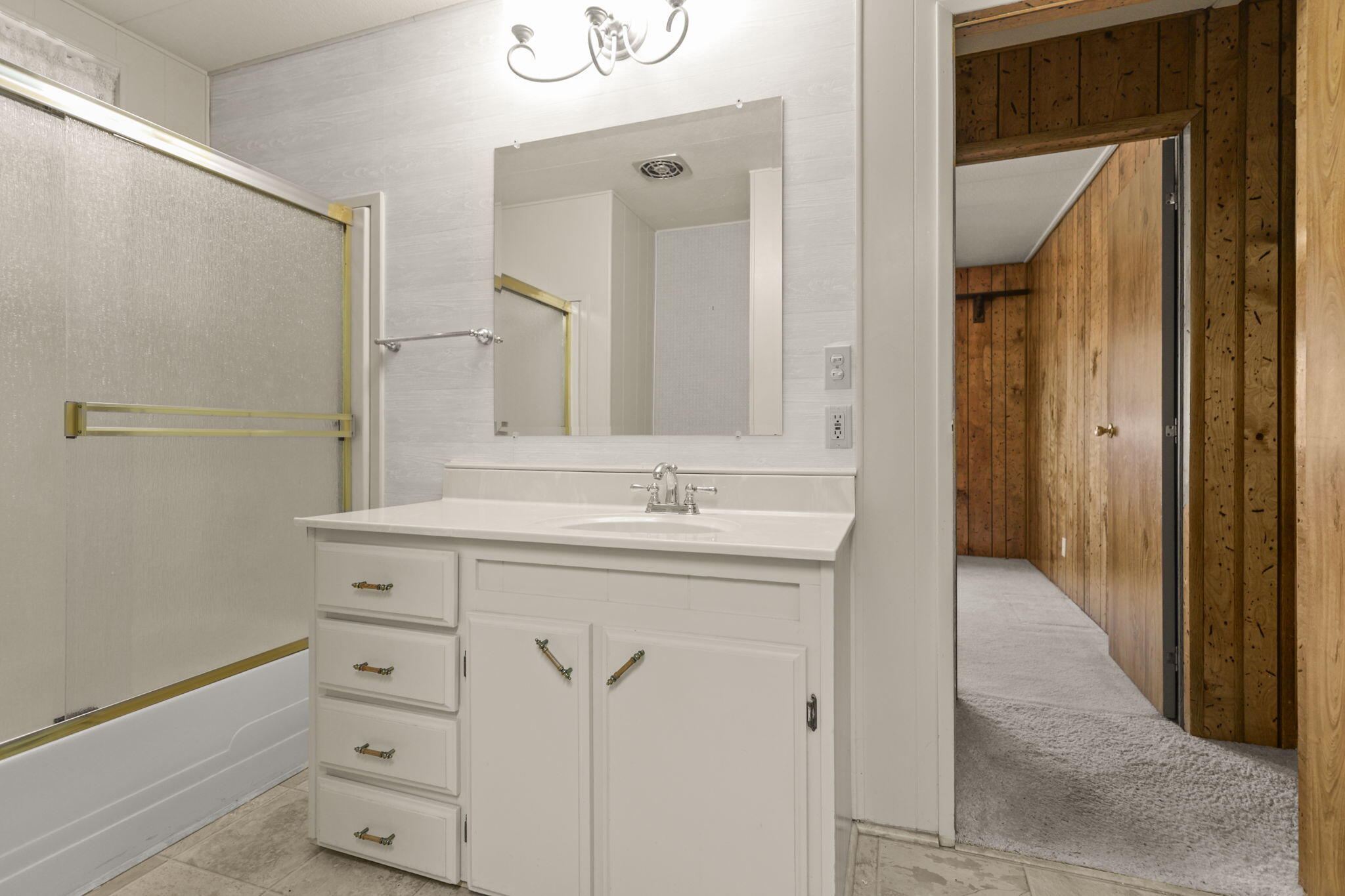 836 August Way Redding, CA 96003 - Photo 22 of 32 a bathroom with a granite countertop sink and a mirror