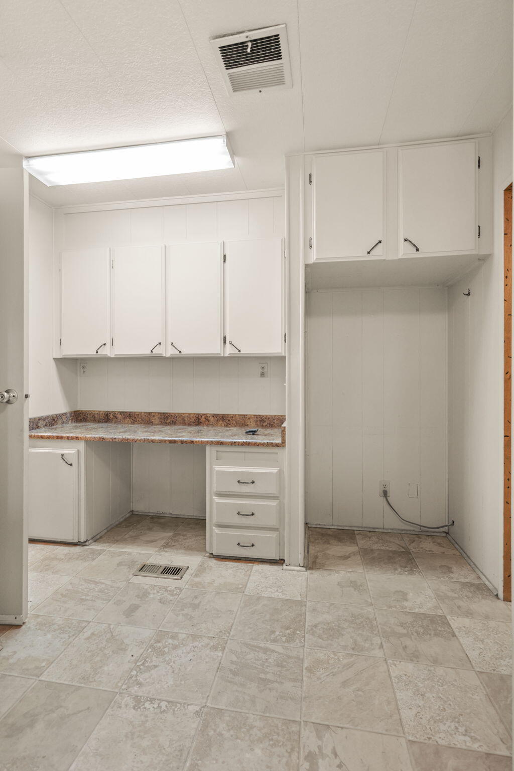 836 August Way Redding, CA 96003 - Photo 25 of 32 a room with cabinets and window