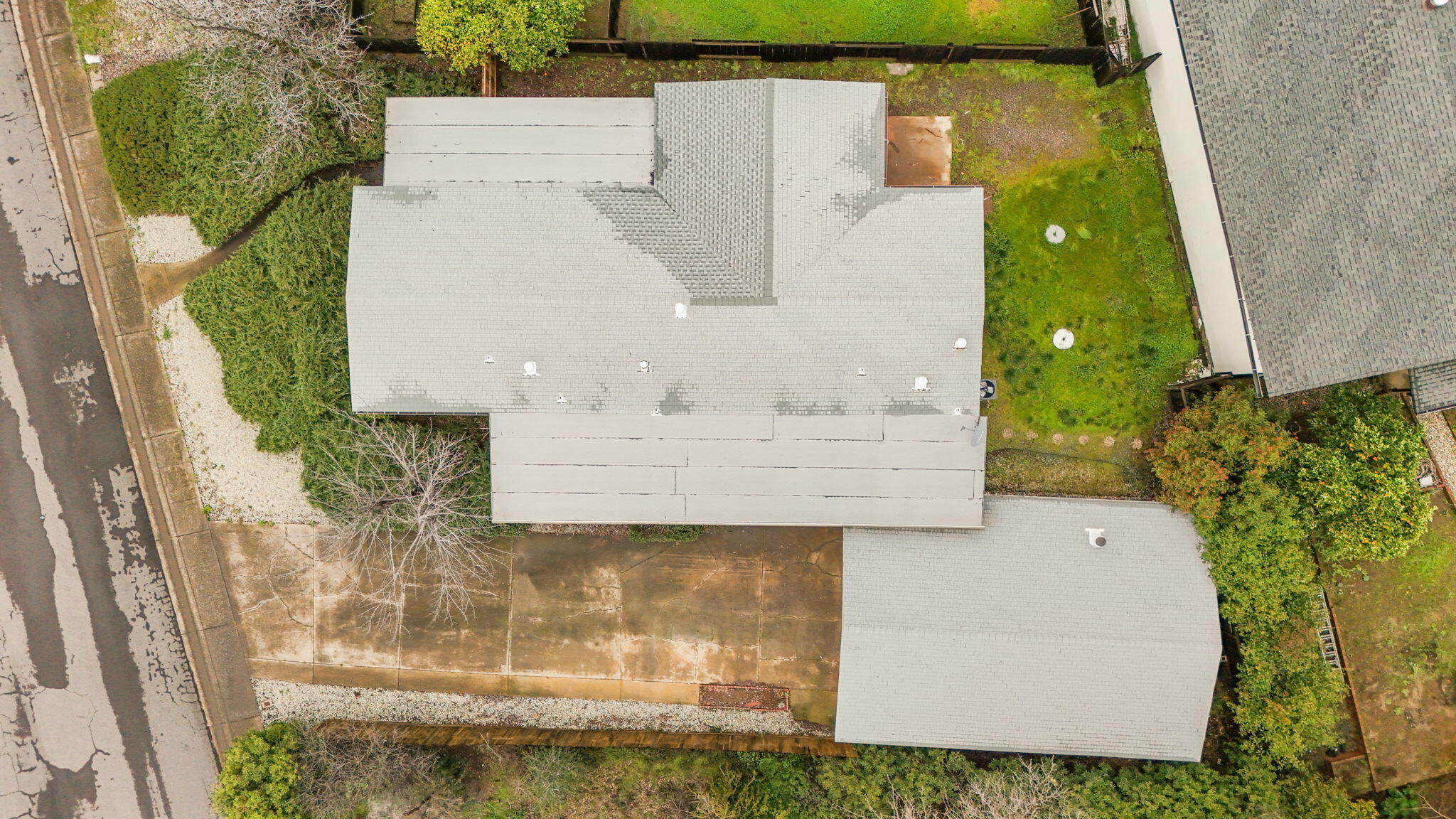 836 August Way Redding, CA 96003 - Photo 31 of 32 aerial view of a house with a garden
