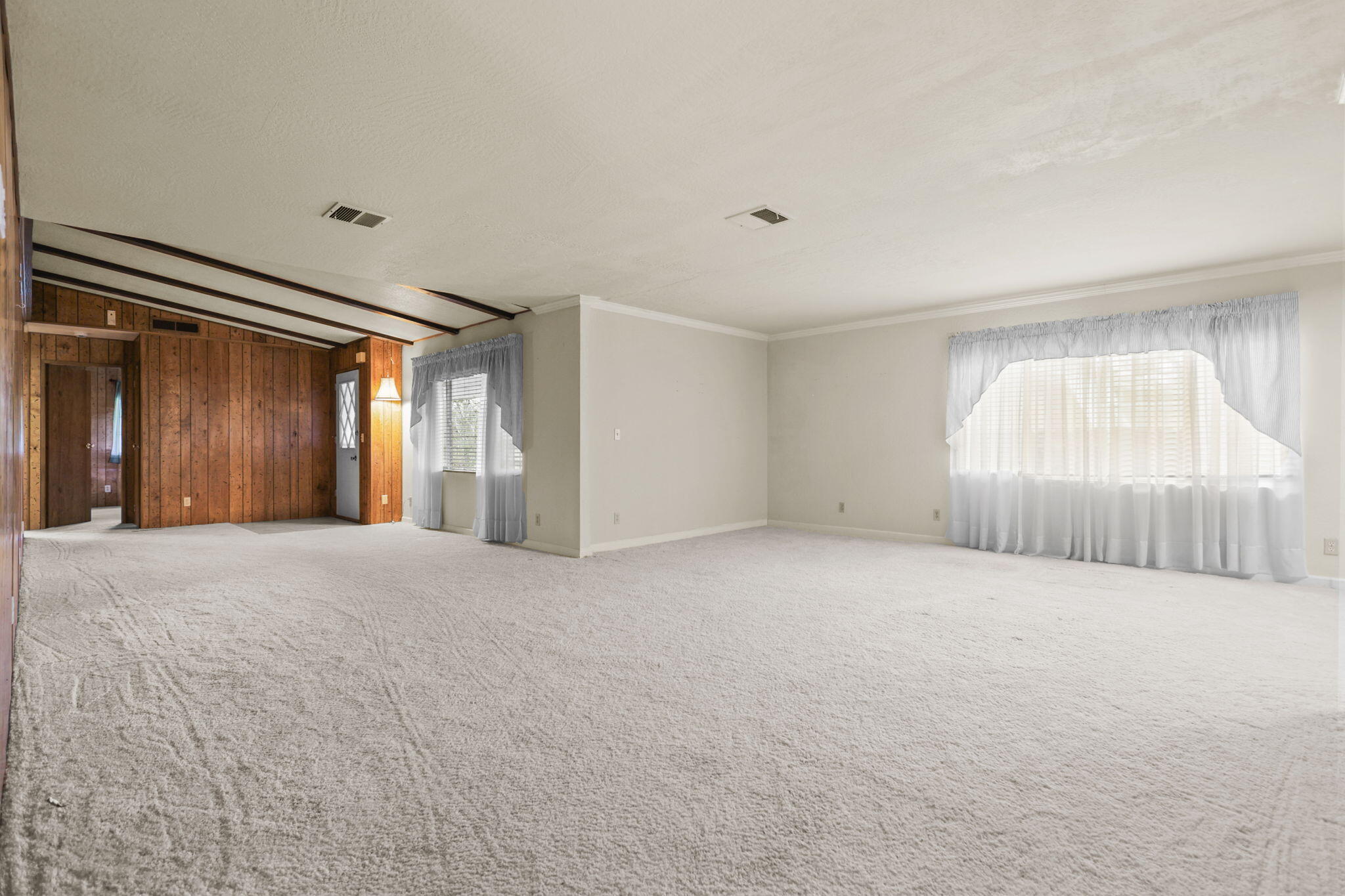 836 August Way Redding, CA 96003 - Photo 5 of 32 a view of an empty room with closet and window