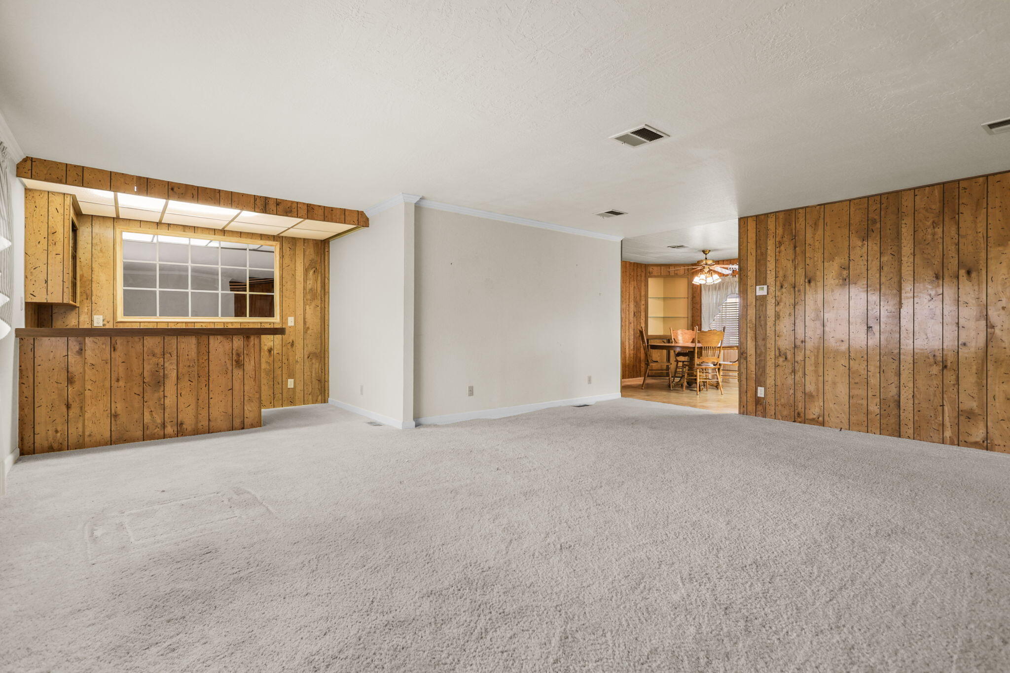 836 August Way Redding, CA 96003 - Photo 9 of 32 a view of an empty room with a window