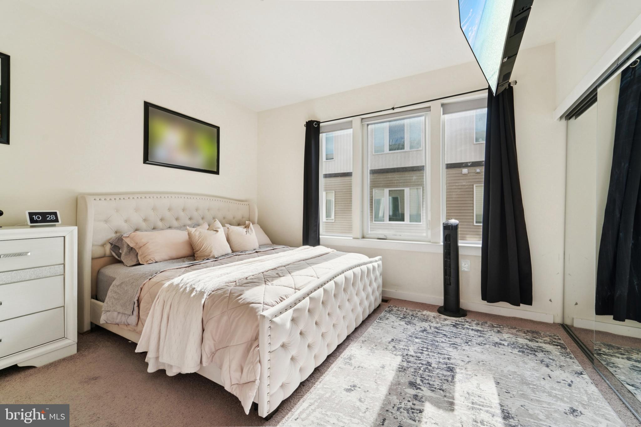 1410 Bexley Lane Frederick, MD 21701 - Photo 23 of 34 a bedroom with a bed and a window