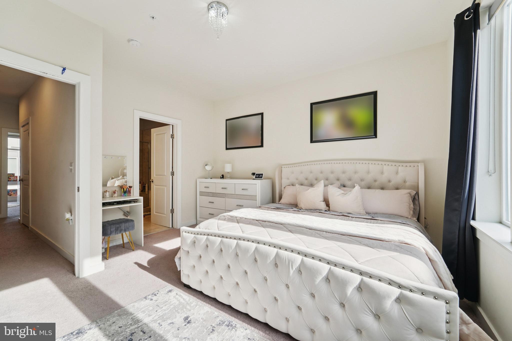 1410 Bexley Lane Frederick, MD 21701 - Photo 24 of 34 a bedroom with a bed and a view of kitchen