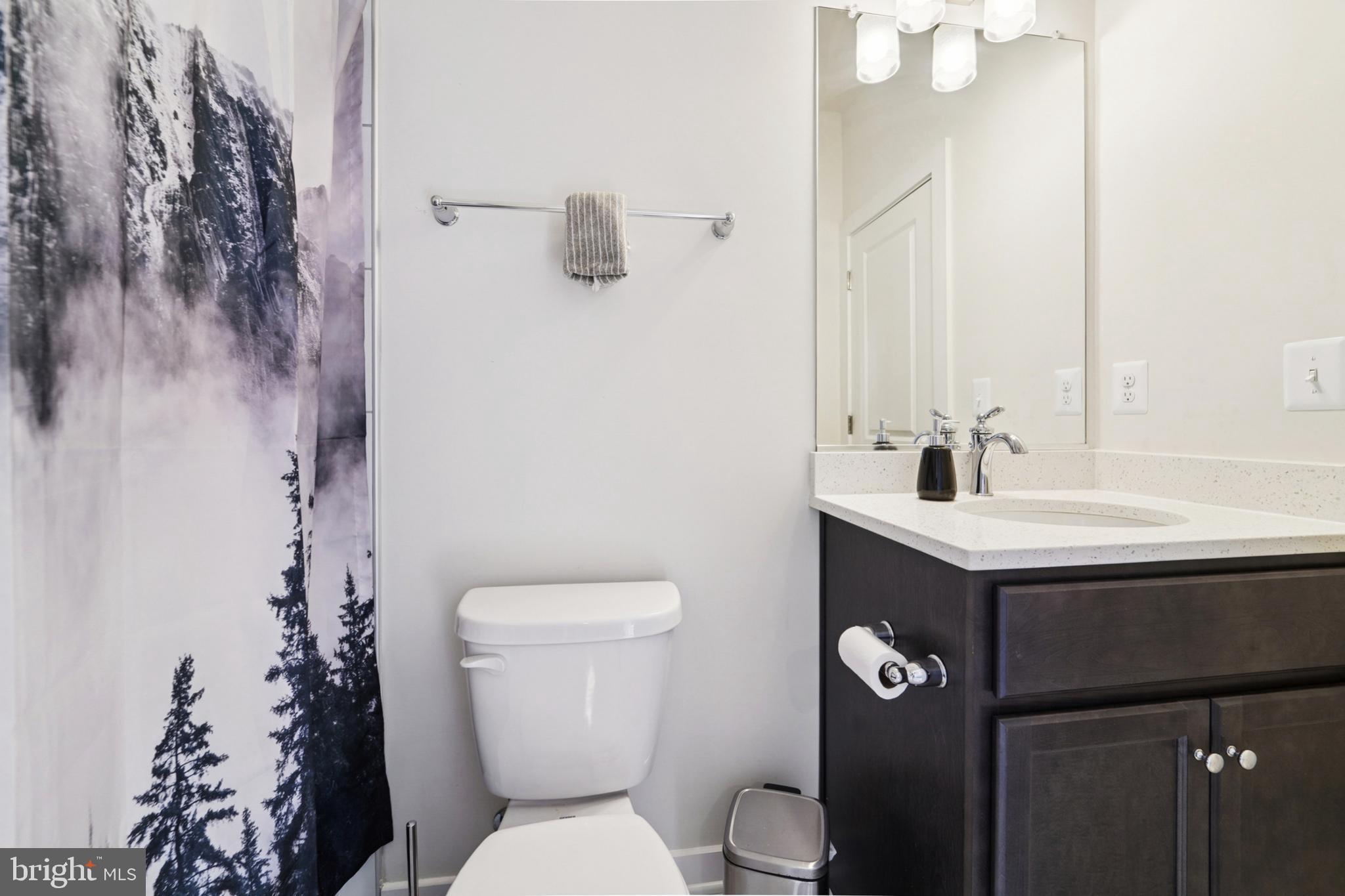 1410 Bexley Lane Frederick, MD 21701 - Photo 26 of 34 a bathroom with a sink toilet and shower