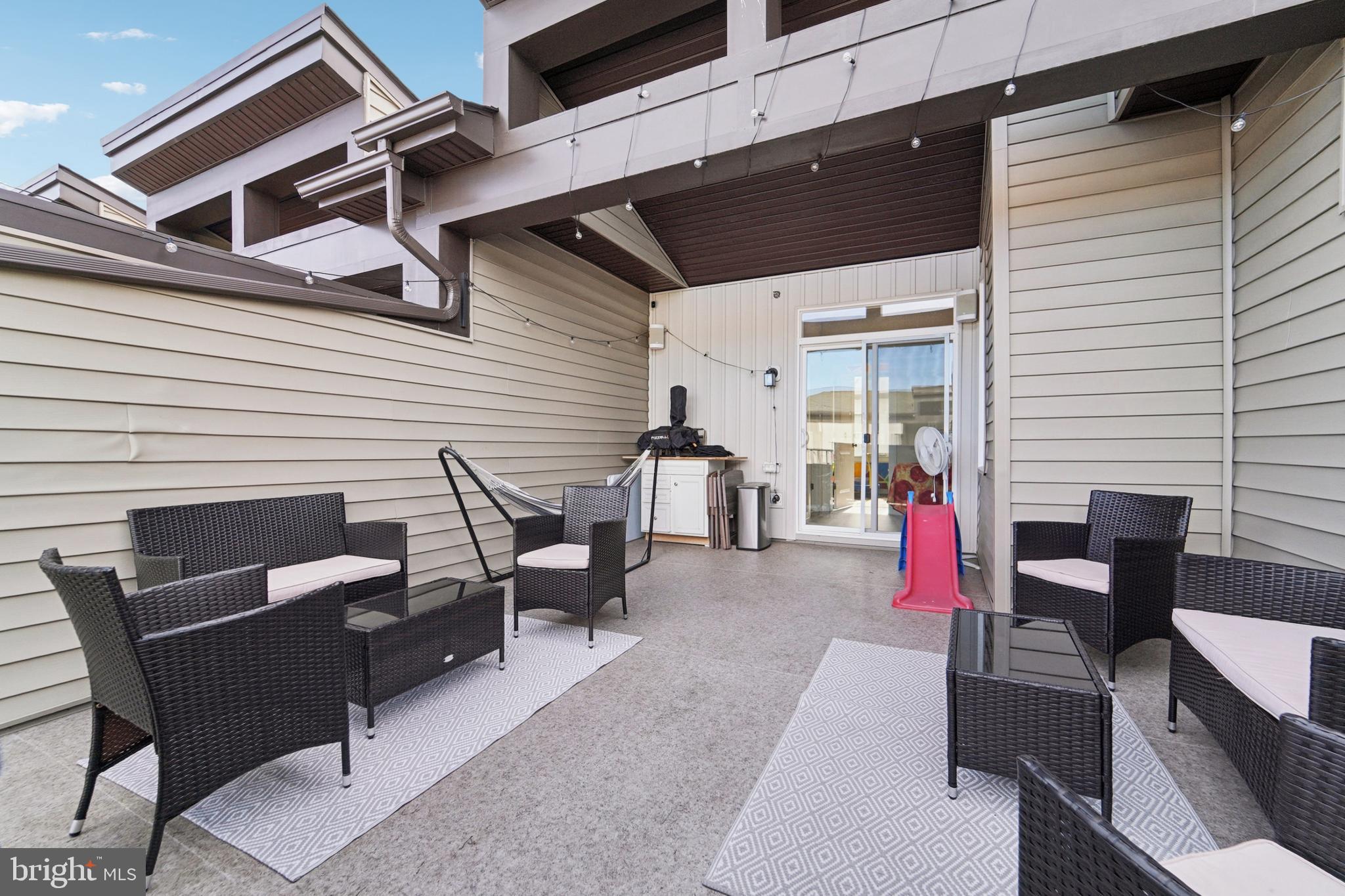 1410 Bexley Lane Frederick, MD 21701 - Photo 31 of 34 a patio with table and chairs