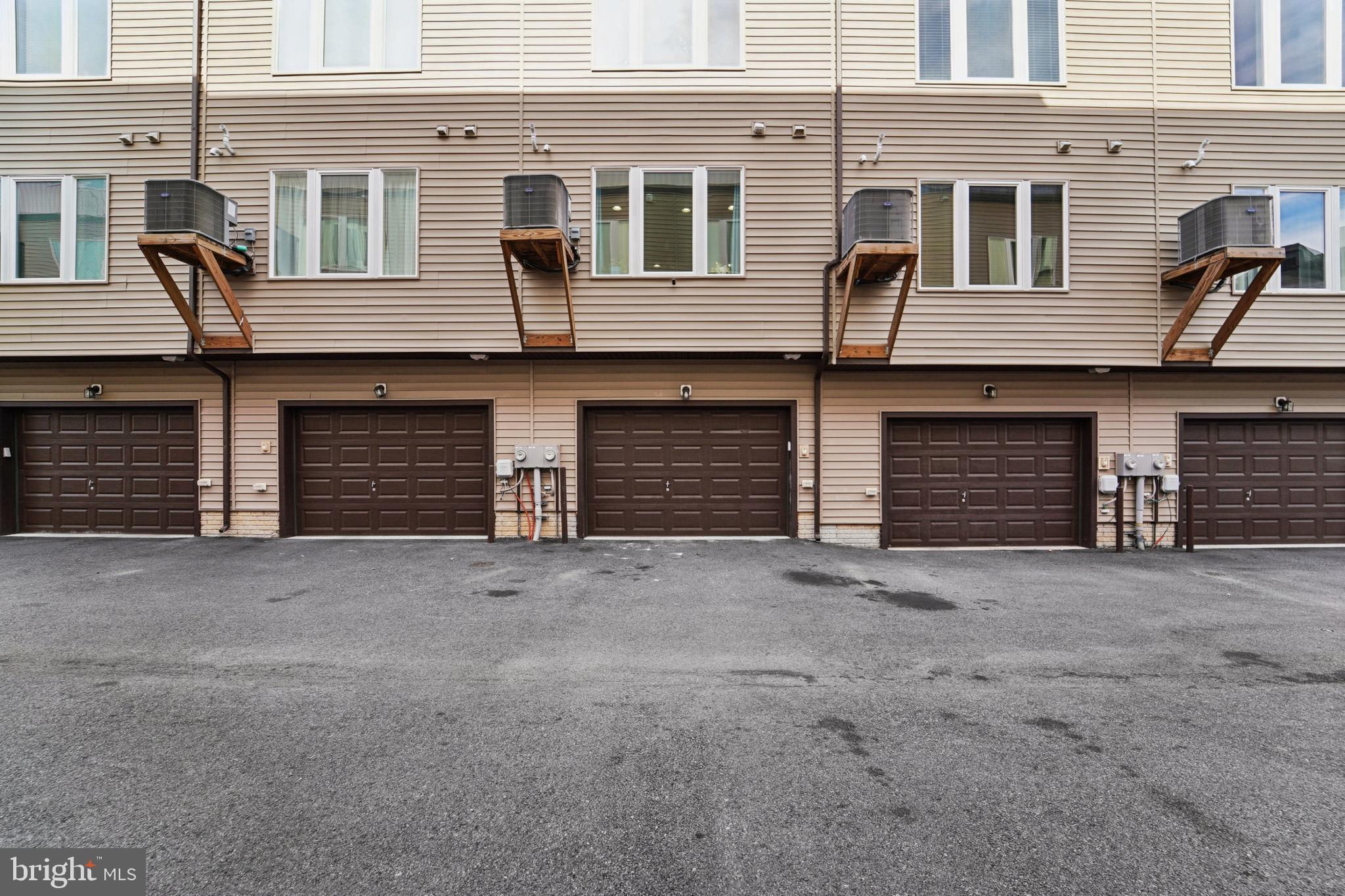 1410 Bexley Lane Frederick, MD 21701 - Photo 33 of 34 a front view of a house with glass windows