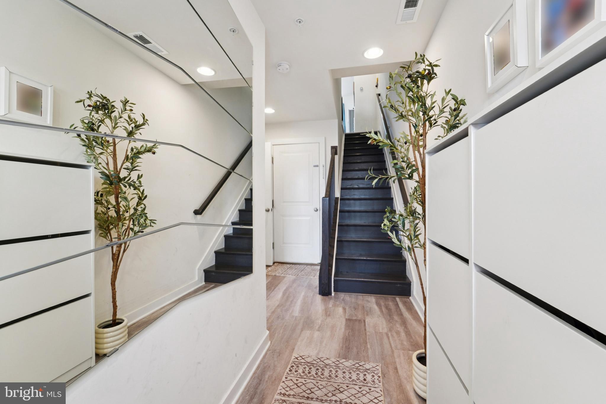 1410 Bexley Lane Frederick, MD 21701 - Photo 6 of 34 a view of entryway and hall with wooden floor