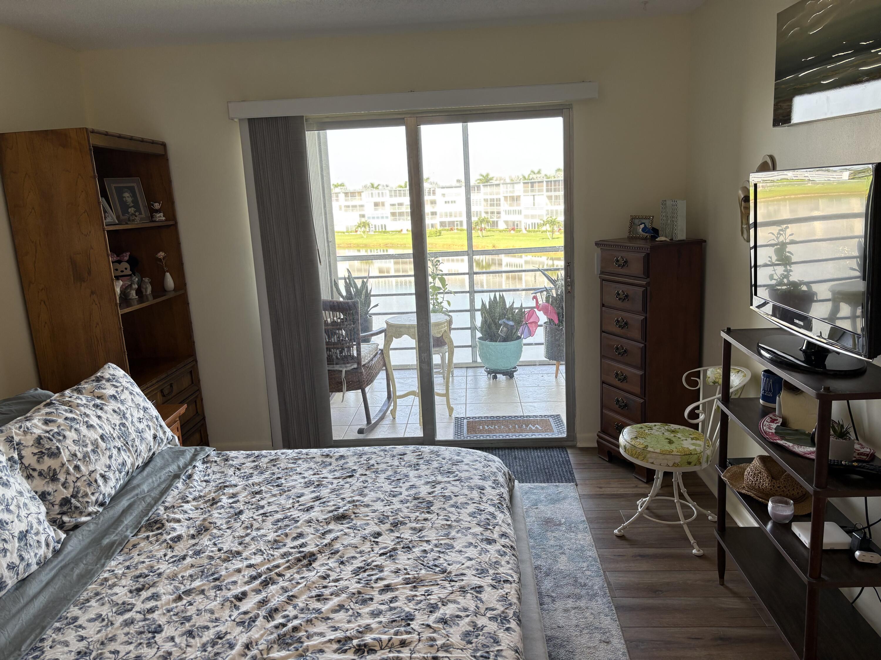 4070 Guildford East Boca Raton, FL 33434 - Photo 15 of 22 PRIMARY BEDROOM