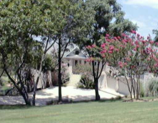 707 Barrett Lane Austin, TX 78733 - Photo 1 of 1 a view of a garden