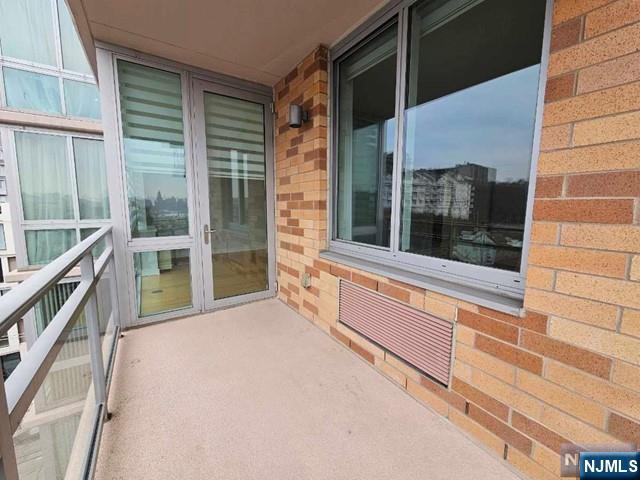 807 Hudson Park Edgewater, NJ 07020 - Photo 15 of 27 a view of an empty room with a balcony