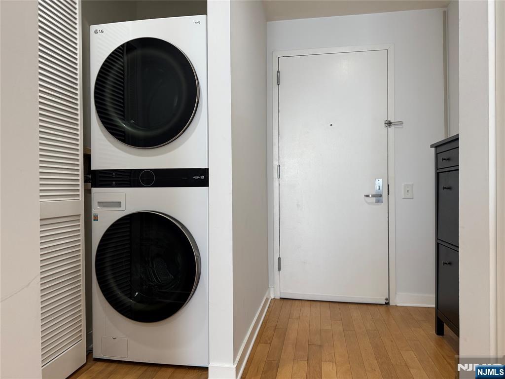 807 Hudson Park Edgewater, NJ 07020 - Photo 27 of 27 a view of a hallway with washer and dryer