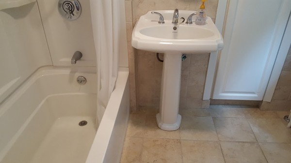 14 Governors Road Milton, MA 02186 - Photo 14 of 19 a bathroom with a sink and shower