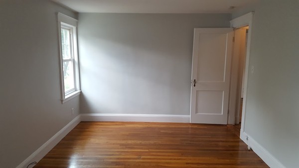 14 Governors Road Milton, MA 02186 - Photo 16 of 19 a view of room with window and wooden floor