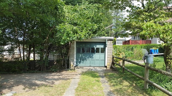 14 Governors Road Milton, MA 02186 - Photo 3 of 19 a pathway of a house with a yard
