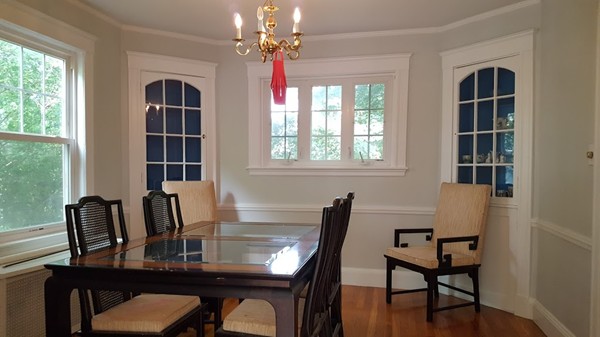 14 Governors Road Milton, MA 02186 - Photo 9 of 19 a view of a dining room with furniture window and wooden floor