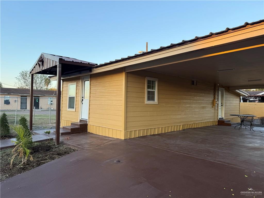 302 Madrigal Street Roma, TX 78584 - Photo 3 of 9 a backyard of a house with shaded area